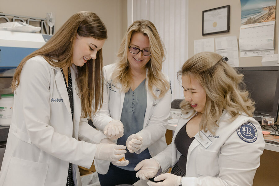 Students from the medicinal and biological chemistry degree program participate in a laboratory task.